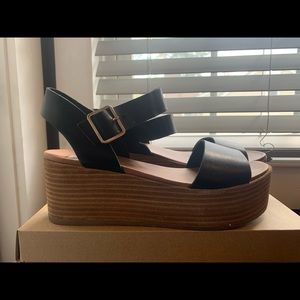 Black leather platform sandals